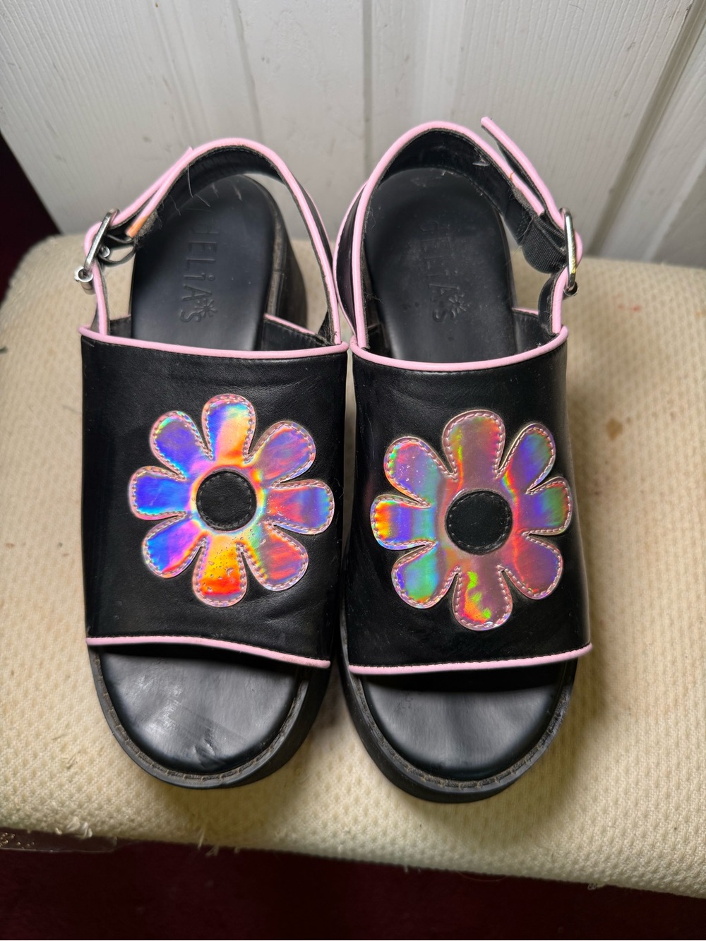 Delia’s holographic flower flatforms shoes